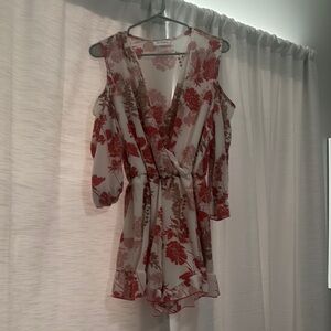 Chic Floral Red and White Romper. Cold Shoulder Style.‎ Size medium